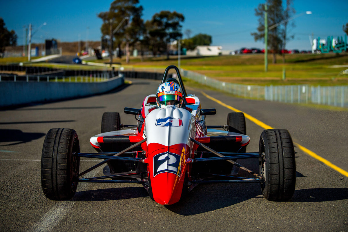 Picture of a Formula Ford Racing Car facing head on at Sydney Motorsport Park race track. F1 Style Driving Experience